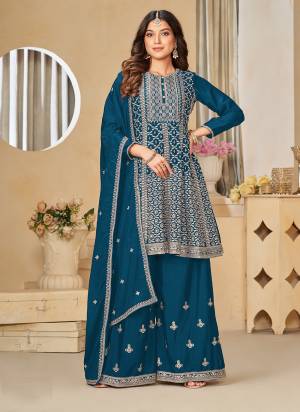 Looking These Designer Paty Wear Plazzo Suit in Fine Colored Pair With Bottom And Dupatta.These Top And Dupatta Are Fabricated On Chinon Pair With Santoon Bottom.Its Beautified With Santoon Inner.Its Beautified With Heavy Designr Sequance,Jari Embroidery Work.