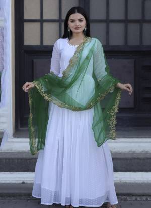 Attrective Looking These Beautiful Looking Readymade Long Gown With Dupatta.These Gown is Fabricated On Faux Georgette And Butterfly Net Dupatta.Its Beautified With Wevon Thousand Butti Designer With Embroidery Work Dupatta.