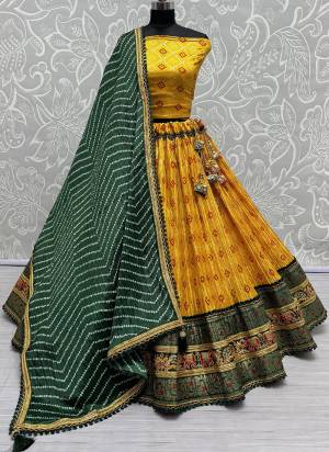 For A Fancy Designer Look,Grab These Lehenga Choli With Dupatta in Fine Colored.These Lehenga And Choli Are Crepe Cotton And Dupatta Are Fabricated On Chinon Pair.Its Beautified With Designer Printed,Crushed With Embroidery Work Lace Border.