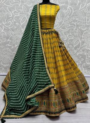 For A Fancy Designer Look,Grab These Lehenga Choli With Dupatta in Fine Colored.These Lehenga And Choli Are Chiffon Cotton And Dupatta Are Fabricated On Chiffon Pair.Its Beautified With Designer Printed,Crushed With Embroidery Work Lace Border.