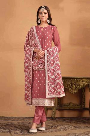 Garb These Party Wear Salwar Suit in Fine Colored Pair With Bottom And Dupatta.These Top And Dupatta Are Fabricated On Faux Georgette Pair With Santoon Bottom.Its Beautified With Santoon Inner.Its Beautified With Designer Heavy Thread Embroidery Work.