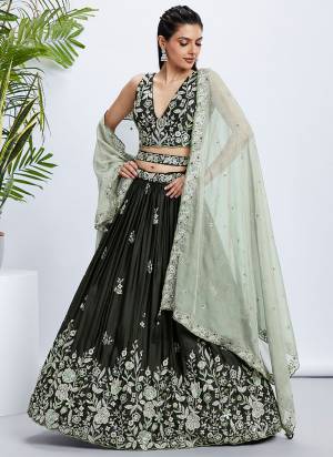 Attrective Looking This Partywear Fine Color Fancy Heavy Designer Choli Fabric Raw Silk And Lahenga Raw Silk And Dupatta Organza In Fabricated Beautified With Attrective Designer Thread,Sequance Embroidery Work. Buy Now.