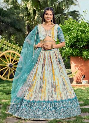 For A Designer Look,Grab These Lehenga Choli in Fine Colored.These Lehenga Are Chinon And Blouse Are Fabricated On Chinon Pair With Dupatta Are Soft Net.Its Beautified With Digital Printed, Designer Jari,Sequance Embroidery Work.