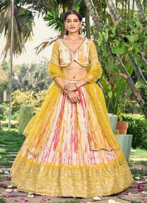 For A Designer Look,Grab These Lehenga Choli in Fine Colored.These Lehenga Are Chinon And Blouse Are Fabricated On Chinon Pair With Dupatta Are Soft Net.Its Beautified With Digital Printed, Designer Jari,Sequance Embroidery Work.