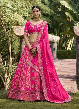 For A Designer Look,Grab These Designer Lehenga Choli in Fine Colored.These Lehenga Are Banarasi Silk And Blouse Are Fabricated On Banglori Silk Pair With Silk Dupatta.Its Beautified With Wevon Designer With Embroidery Work.