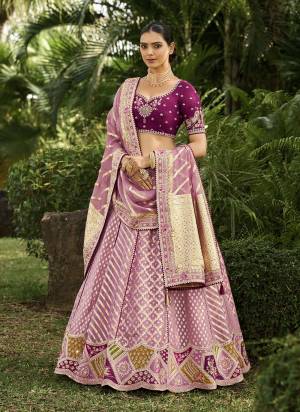 For A Designer Look,Grab These Designer Lehenga Choli in Fine Colored.These Lehenga Are Crepe Georgette And Blouse Are Fabricated On Phantom Silk Pair With Crepe Georgette Dupatta.Its Beautified With Wevon Designer With Embroidery Work.