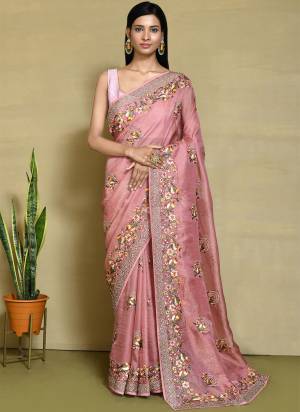 Look Attrective These Designer Party Wear Saree in Fine Colored.These Saree And Blouse Are Net Organza Silk is Fabricated.Its Beautified Desiger Heavy Embroidery With Stone Work.