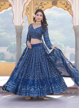 For A Designer Look,Grab These Lehenga Choli in Fine Colored.These Lehenga And Blouse Are Fabricated On Faux Georgette Pair With Faux Georgette Dupatta.Its Beautified With Designer Heavy Sequance,Thread Embroidery Work.