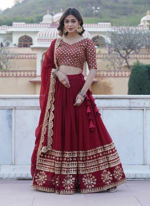 For A Designer Look,Grab These Lehenga Choli in Fine Colored.These Lehenga And Blouse Are Fabricated On Faux Georgette Pair With Faux Georgette Dupatta.Its Beautified With Designer Heavy Sequance Embroidery Work.