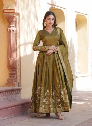Garb These Beautiful Looking Readymade Long Gown With Dupatta.These Gown is Fabricated On Viscose Cosmos And Viscose Cosmos Dupatta.Its Beautified With Designer Jari, Sequance Embroidery Work.