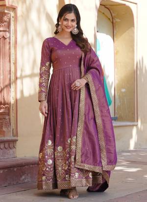 Garb These Beautiful Looking Readymade Long Gown With Dupatta.These Gown is Fabricated On Viscose Cosmos And Viscose Cosmos Dupatta.Its Beautified With Designer Jari, Sequance Embroidery Work.