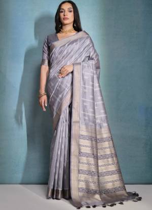 Garb These Party Wear Fancy Saree in Fine Colored.These Saree And Blouse is Fabricated On Tusser Silk.Its Beautified With Weaving Ikkat Designer.