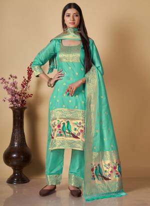 Garb This Suits In Lovely Color.Its Pretty Top Is Soft Banarasi Silk Based Paired Bottom Banarasi Silk And Banarasi Silk Fabricated Dupatta Are Wevon Jari,Thread Designer. Which Gives An Attractive To The Dress.