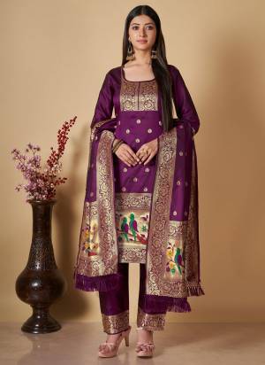 Garb This Suits In Lovely Color.Its Pretty Top Is Soft Banarasi Silk Based Paired Bottom Banarasi Silk And Banarasi Silk Fabricated Dupatta Are Wevon Jari,Thread Designer. Which Gives An Attractive To The Dress.