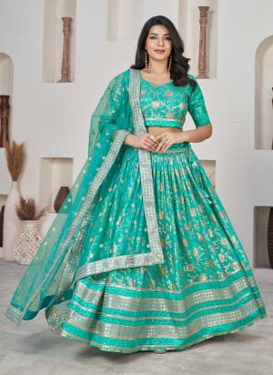 For A Designer Look,Grab These Lehenga Choli in Fine Colored.These Lehenga And Blouse Are Fabricated On Dolla Silk Pair With Net Dupatta.Its Beautified With Weaving Jacquard Designer With Embroidery Work.