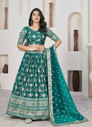 For A Designer Look,Grab These Lehenga Choli in Fine Colored.These Lehenga And Blouse Are Fabricated On Dolla Silk Pair With Net Dupatta.Its Beautified With Weaving Jacquard Designer With Embroidery Work.