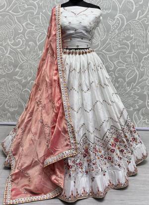 For A Fancy Designer Look,Grab These Lehenga Choli With Dupatta in Fine Colored.These Lehenga And Choli Are Rangoli Silk And Dupatta Are Fabricated On Georgette Pair.Its Beautified With Designer Jari,Sequance,Multy Thread Embroidery Work.