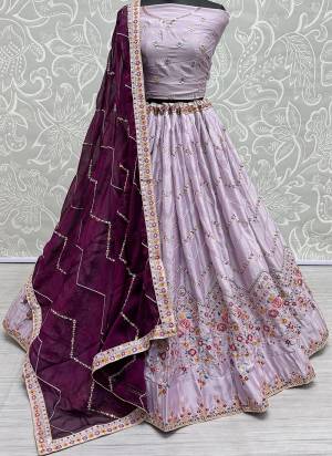 For A Fancy Designer Look,Grab These Lehenga Choli With Dupatta in Fine Colored.These Lehenga And Choli Are Rangoli Silk And Dupatta Are Fabricated On Georgette Pair.Its Beautified With Designer Jari,Sequance,Multy Thread Embroidery Work.