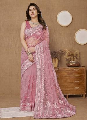 Attrective Look These Saree in Fine Colored.These Saree Are Soft Net And Blouse is Mono Banglori Fabricated.Its Beautified With Designer Thread Embroidery Work.