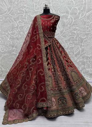 For A Fancy Designer Look,Grab These Lehenga Choli With Dupatta in Fine Colored.These Lehenga And Choli Are Velvet And Dupatta Are Fabricated On Soft Net & Velvet Pair.Its Beautified With Designer Hand Mirror, Dori,Jari,Sequance,Multy Thread Embroidery,Diamond Work.