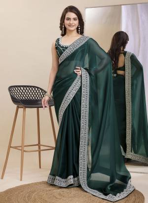 Garb These Party Wear Saree in Fine Colored.These Saree Are Jimmy Chau Silk And Blouse is Art Silk Fabricated.Its Beautified With Designer Embroidery Work Lace Border,Blouse.