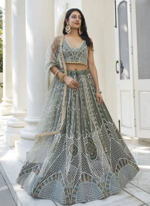 For A Different Look,Grab These Party Wear Designer Lehenga in All Over Pretty Colored Pair With Blouse And Dupatta.These Lehenga Choli And Dupatta is All Over Butterfly Net Base Fabric With Designer Thread,Sequance Embroidery Work.