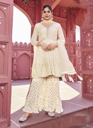 Attrective Looking These Sharara Suit in Fine Colored Pair With Bottom And Dupatta.These Top And Bottom Are Fabricated On Georgette Pair With Net Dupatta.Its Beautified With Heavy Designer Mirror,Thread Embroidery Work.