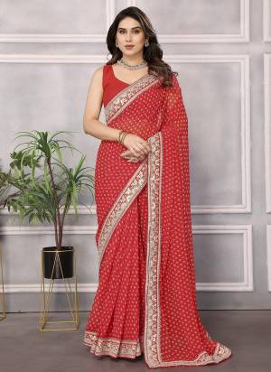 Garb These Party Wear Saree in Fine Colored.These Saree Are Georgette And Blouse is Art Silk Fabricated.Its Beautified With Dabby Designer Printed, Embroidery Work Lace Border.