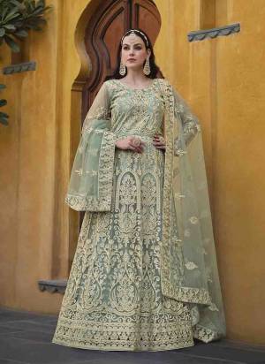 Garb These Anarkali Suit in Fine Colored Pair With Bottom And Dupatta.These Top Are Butterfly Net And Dupatta Are Fabricated On Butterfly Net Pair With Japan Satin Bottom.Its Beautified With Designer Heavy Embroidery With Stone Work.