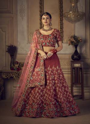 Grab These Party Wear Lehenga Choli in Fine Colored.These Lehenga Are Taffera Silk Choli Are Taffeta Silk And Dupatta Are Fabricated On Net Pair.Its Beautified With Designer Embroidery Work.