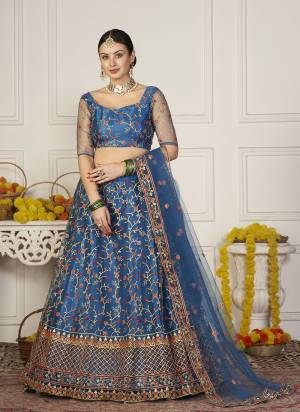 Grab These Party Wear Lehenga Choli in Fine Colored.These Lehenga Are Net Choli Are Net And Dupatta Are Fabricated On Net Pair.Its Beautified With Designer Embroidery Work.