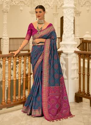 Looking These Party Wear Traditional Saree in Fine Colored.These Saree And Blouse is Fabricated On Banarasi Silk.Its Beautified With Weaving Patola Designer.