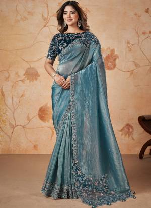 Look Attrective These Designer Party Wear Saree in Fine Colored.These Saree Are Banarasi Crush Silk And Blouse Silk is Fabricated.Its Beautified Heavy Desiger Embroidery,Patch,Pearl Work.