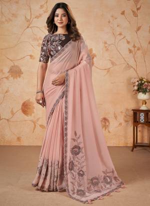 Look Attrective These Designer Party Wear Saree in Fine Colored.These Saree Are Crepe Satin Silk And Blouse Melboen Silk is Fabricated.Its Beautified Heavy Desiger Embroidery,Patch,Pearl Work.