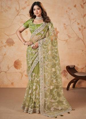 Look Attrective These Designer Party Wear Saree in Fine Colored.These Saree Are Net And Blouse Slub is Fabricated.Its Beautified Heavy Desiger Embroidery,Patch,Pearl Work.