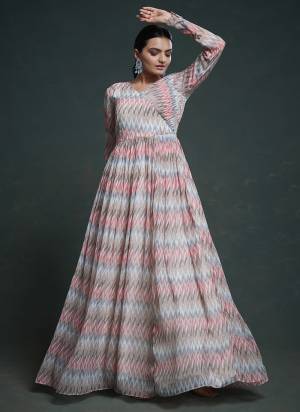 Garb These Beautiful Looking Readymade Gown.These Gown Are Georgette Fabricated.Its Beautified With Disigner Printed With Embroidery Work.