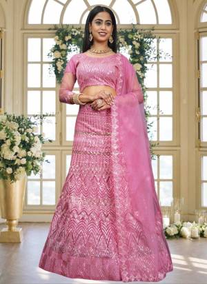 Grab These Beautiful Colored Lehenga Choli.These Lehenga and Dupatta Are Fabricated On Net Pair With Net Blouse.Its Beautified With Heavy Thread,Sequance Embroidery Work.