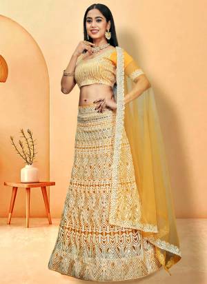 Looking These Beautiful Colored Lehenga Choli.These Lehenga and Dupatta Are Fabricated On Net Pair With Net Blouse.Its Beautified With Designer Sequance Embroidery Work.