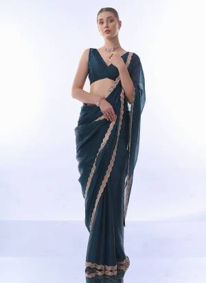 Looking These Party Wear Saree in Fine Colored.These Saree is Fabricated On Burburry Pair With Art Silk Blouse.Its Beautified With Designer Work Lace Border,Swarovski Work.