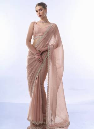 Looking These Party Wear Saree in Fine Colored.These Saree is Fabricated On Burburry Pair With Art Silk Blouse.Its Beautified With Designer Work Lace Border,Swarovski Work.