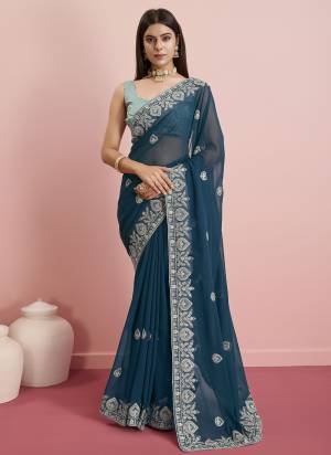 Garb These Party Wear Saree in Fine Colored.These Saree Are Georgette And Blouse is Art Silk Fabricated.Its Beautified With Designer Coding Embroidery Work.