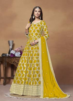 Garb These Party Wear Anarkali Suit in Fine Colored Pair With Bottom And Dupatta.These Top Are Dola Jacquard And Dupatta Are Fabricated On Chinon Pair With Santoon Bottom.Its Beautified With Santoon Inner.Its Beautified With Wevon Jari Designer With Embroidery Work.