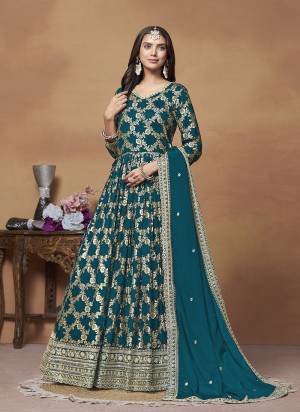 Garb These Party Wear Anarkali Suit in Fine Colored Pair With Bottom And Dupatta.These Top Are Dola Jacquard And Dupatta Are Fabricated On Chinon Pair With Santoon Bottom.Its Beautified With Santoon Inner.Its Beautified With Wevon Jari Designer With Embroidery Work.