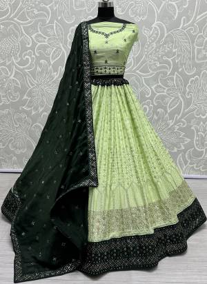 For A Fancy Designer Look,Grab These Lehenga Choli With Dupatta in Fine Colored.These Lehenga And Choli Are Georgette And Dupatta Are Fabricated On Chiffon Pair.Its Beautified With Designer Sequance,Cotton Thread Embroidery Work.