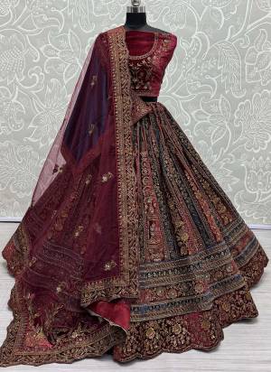 For A Fancy Designer Look,Grab These Lehenga Choli With 2 Dupatta in Fine Colored.These Lehenga And Choli Are Velvet And Dupatta Are Fabricated On Soft Net & Velvet Pair.Its Beautified With Designer Patch,Sequance,Thread,Jari Embroidery Diamond Work.