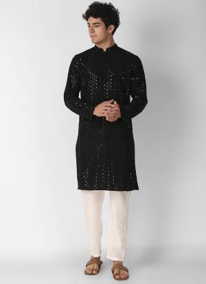 Garb These Designer Mens Wear Kurta.Its Cotton Fabriced.Its Designer Thread,Sequance Embroidery Work