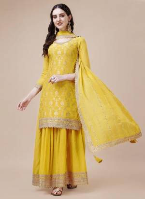 Attrective Looking These Party Wear Sharara Suit in Fine Colored Pair With Bottom And Dupatta.These Top Are Viscose Chinon And Dupatta Are Fabricated On Chinon Pair With Chinon Bottom.Its Beautified With Wevon Jacquard Designer With Embroidery Work.