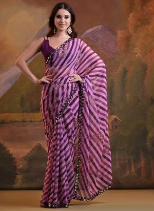 Garb These  Saree in Fine Colored.These Saree Are Georgette And Blouse is Mono Banglori Fabricated.Its Beautified With Laheriya Printed, Foil Printed With Mirror Lace Work.