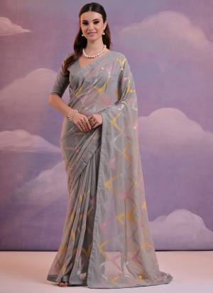 Attrective These Party Wear Saree in Fine Colored.These Saree Are Georgette And Blouse is Mono Banglori Fabricated.Its Beautified With Designer Sequance Embroidery Work.