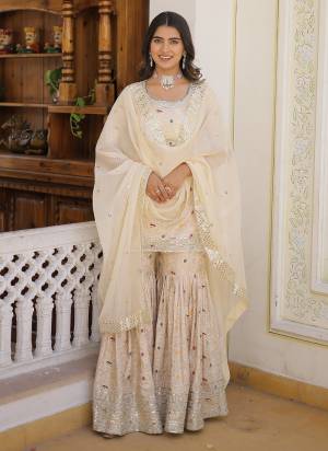 Garb These Beautiful Looking Party Wear Readymade Gharara Suits With Dupatta.These Top And Bottom is Fabricated On Viscose Jacquard And Russian Silk Dupatta.Its Beautified With Wevon Designer With Jari,Sequance Embroidery Work.